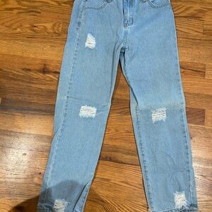Distressed Light Blue Denim Jeans